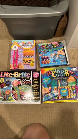 Collection of Used Bracelet Kits and a Lite Brite