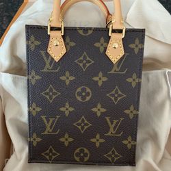 Brand New Louis Vuitton Petit Sac Bag