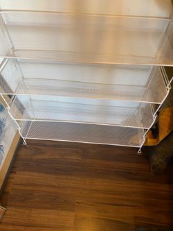 white, four-tier mesh shoe rack