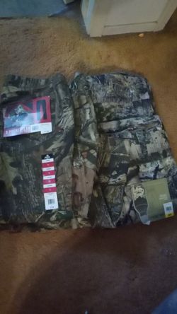 Two ladies pants size 14 and 12 and two men's pants size 38 32 32 30