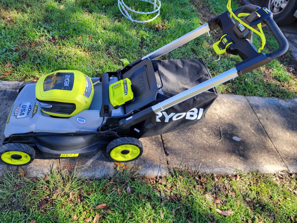 RYUBI BRUSHLESS RECHARGEABLE SELF-PROPELLED LAWN MOWER. 