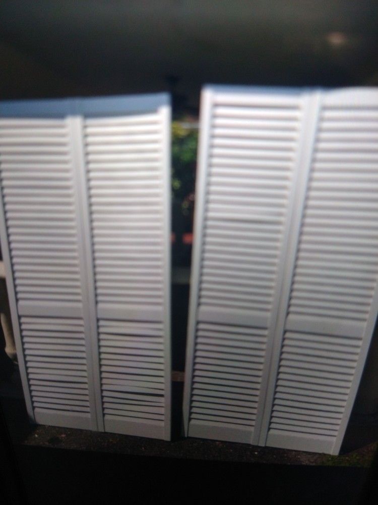 Two Plastic Fold Up Doors