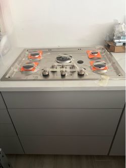 GE Profile gas stop top