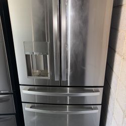 GE Stainless Steel Refrigerator And Freezer