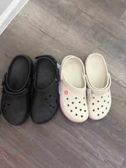Two Pairs of Crocs Clogs