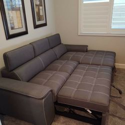 Ferriday Taupe Storage Sleeper Sectional

