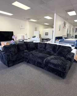 Black corduroy sleeper sectional