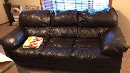 Brown leather couch/love seat set