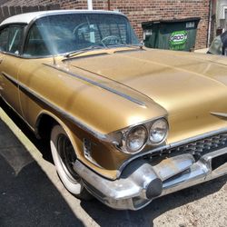 Cadillac 1958 Sedan gold 