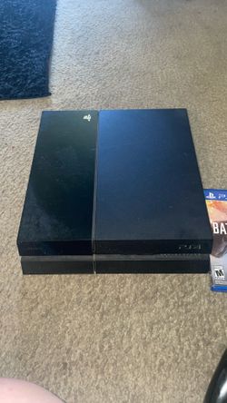 Playstation 4 with controller and BattleField 1