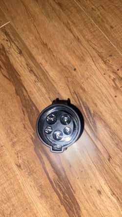 Aftermarket SAE J1772 Charging Adapter For Teslas.