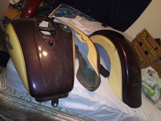 Motorcycle tank and finders
