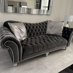 Dark Gray Sofa With Two Cushions
