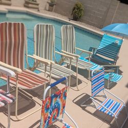 Beach Chairs And Umbrellas 