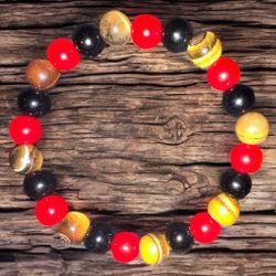 Brand new Black Onyx, Red Jasper and Tigers Eye bracelet
