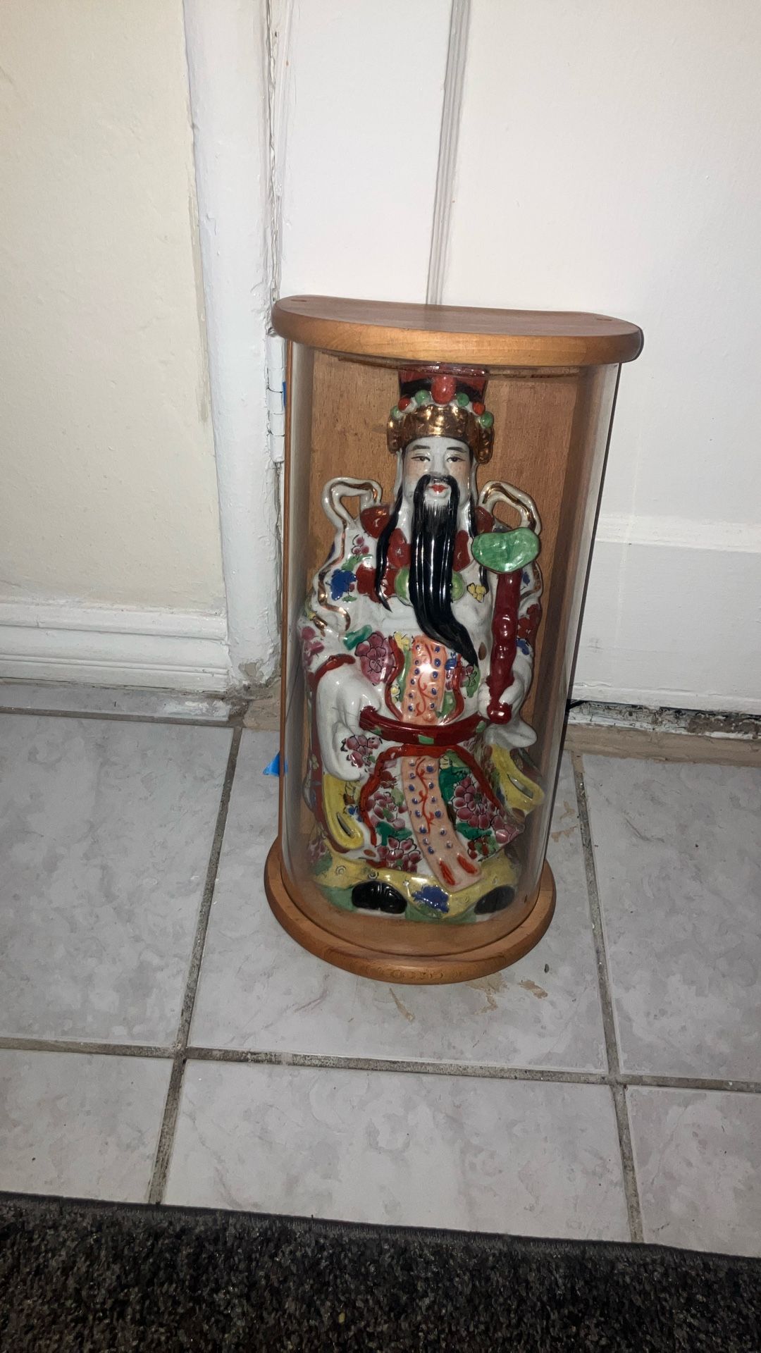 Asian statue casing