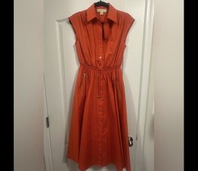 Vibrant Orange Sleeveless Dress with Gold Accents