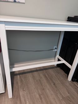 42” White table (24” D x 42” W x 42” H)