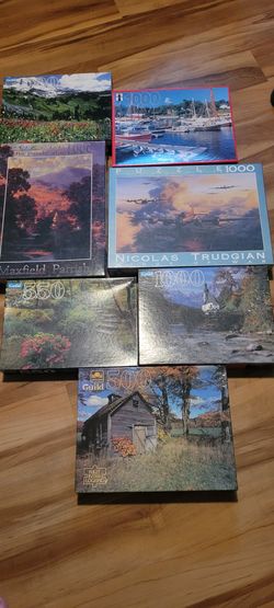 7 jigsaw puzzles never opened