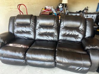 Brown leather sofa/two piece