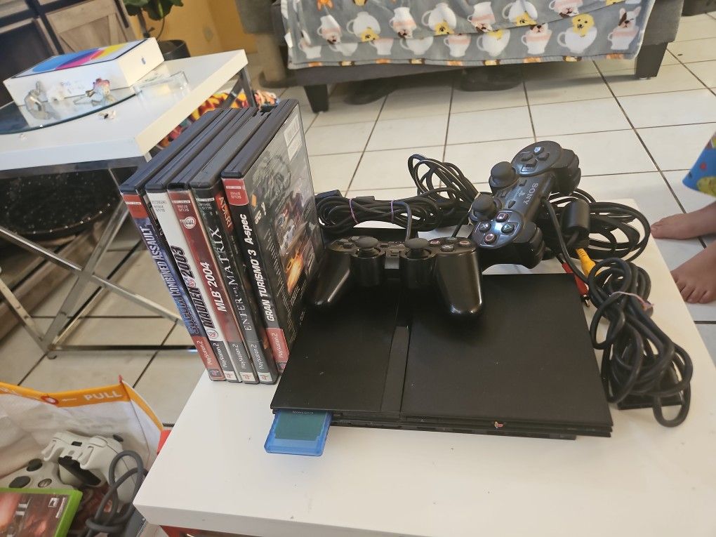 PZ2 Perfecto.estado. 2 Controles. 6 Juegos