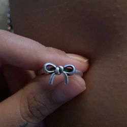 James Avery Delicate Bow Band Ring crafted in sterling silver.