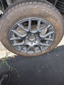 1. 15" universal rim with very Good tire