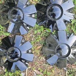 4 black Chrome rims tires and center For sale.