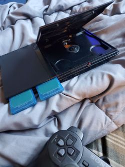 Ps2 slim & controller & game works great