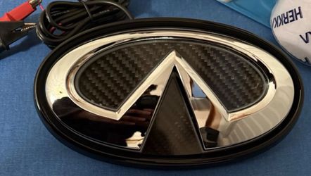 Infiniti Q50 White LED Badge Emblem. Chrome with Black Carbon Fiber