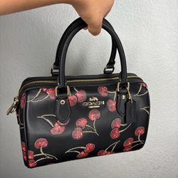 Coach black cherry print ROWAN