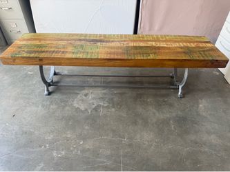 Industrial reclaimed wood bench with cast-iron base