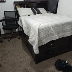 Queen Size Chocolate Wood Bed 10 Drawers.