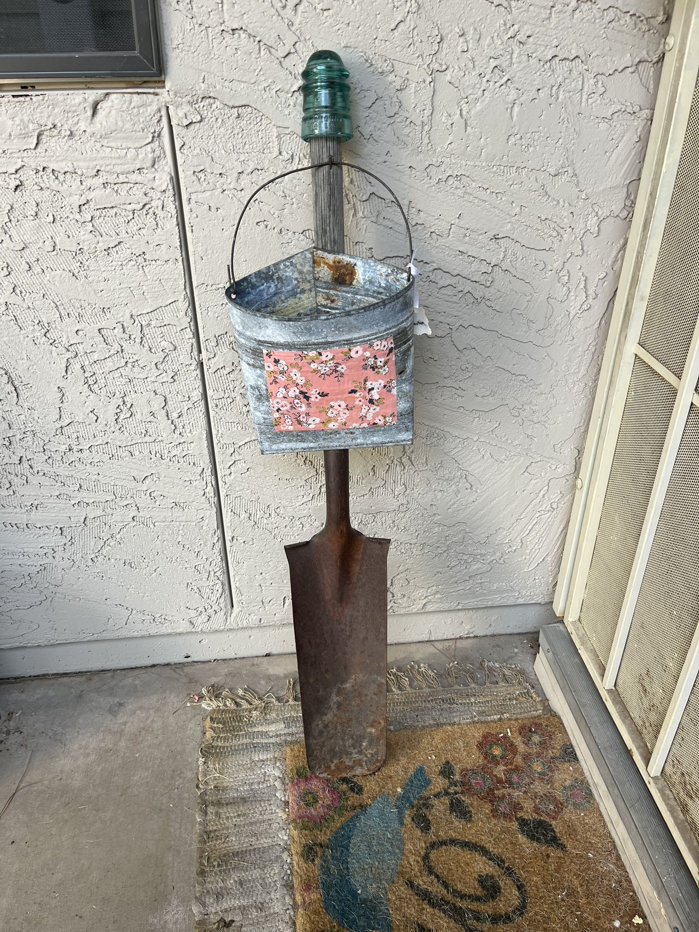 Rustic Shovel With Plant Holder And Insulator On Top