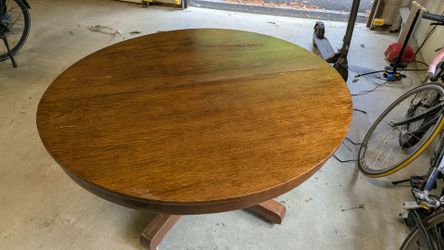 Round wooden kitchen or dining room table