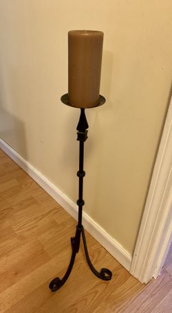 Raw iron candle stick holder (with candle included)