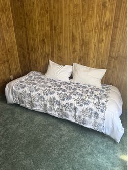Twin bed with new bedding