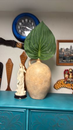 Porron y la Estatua $30