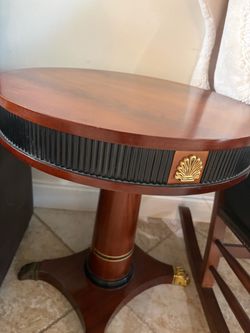 Hand-painted round Versace table.