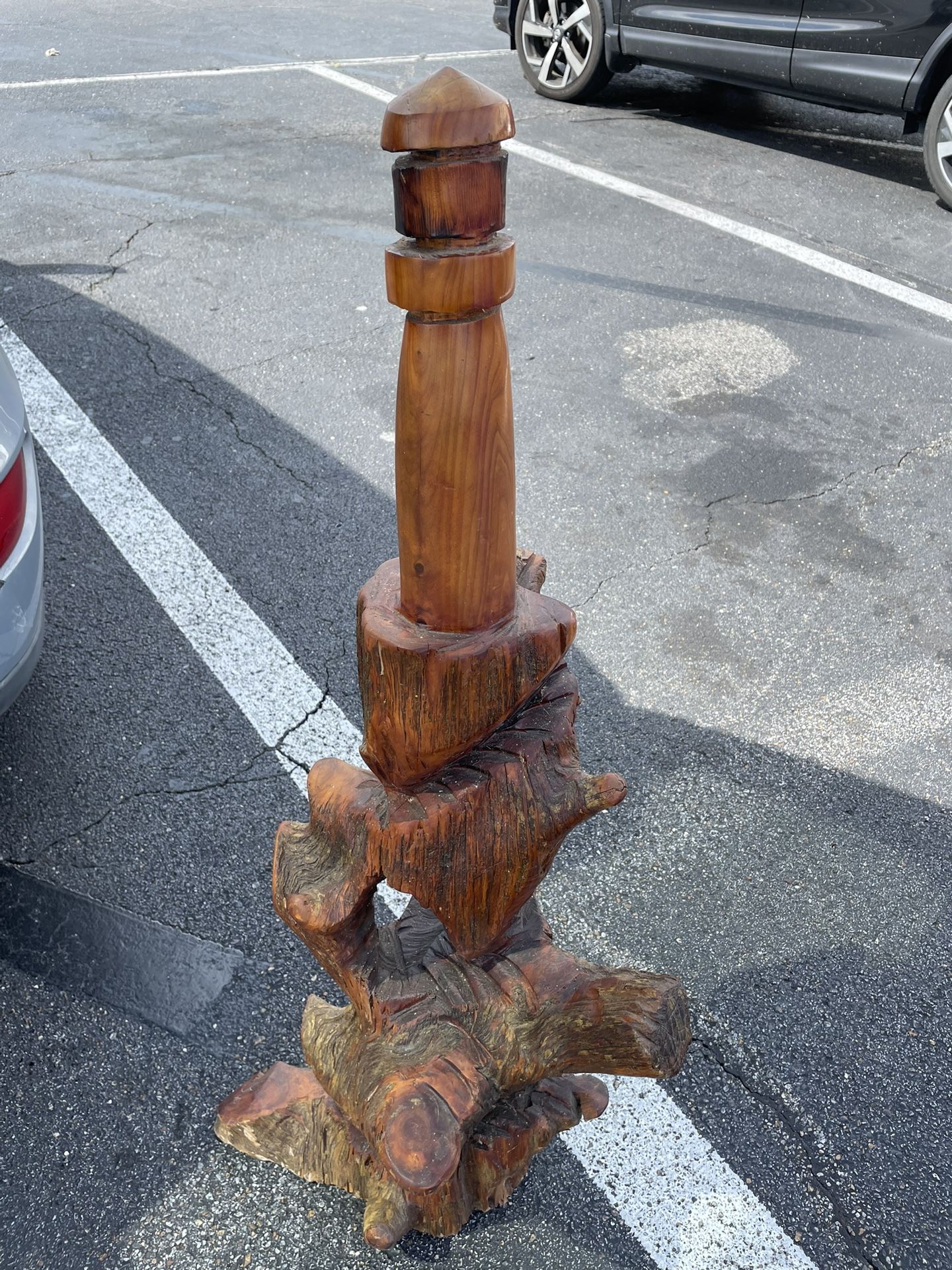 Wood Carving Of A Lighthouse