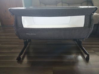 Mika Micky Beside Bassinet