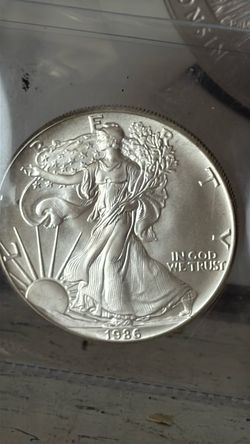 American Silver Eagles 1986, 1997 & 1998 Brilliantly Uncirculated  $150 each or all for $400