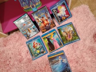 Disney originals no scratches DVDS included is some live action movies like Aladdin and Cinderella $15 takes all of them together