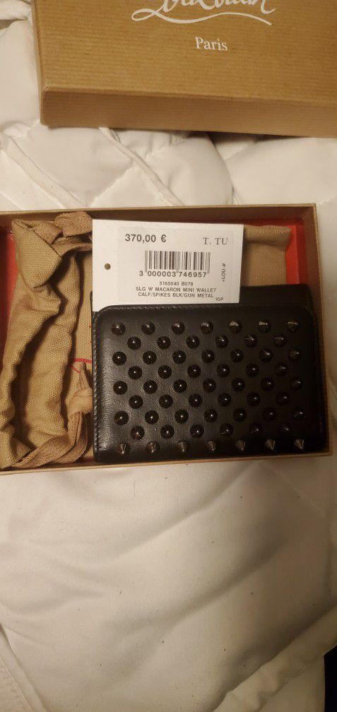 Louboutin wallet with spikes, paid 400 mint condition