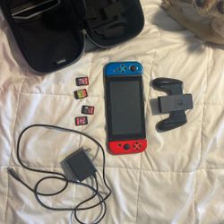 Nintendo switch with four games