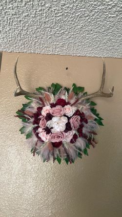 Real Reindeer antlers w/faux florals hanging wall decor