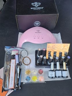 Gel nail polish kit with nail lamp