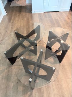 Glass coffee table and side tables.
