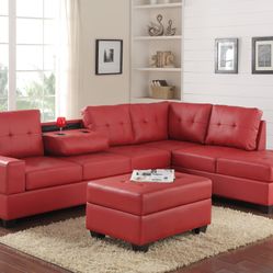 Red leather sectional with storage ottoman.