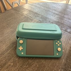 🎮 Nintendo Switch Lite – Turquoise w/ Carrying Case – $95 